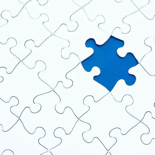Abstract white tiles with a central magnifying glass icon
